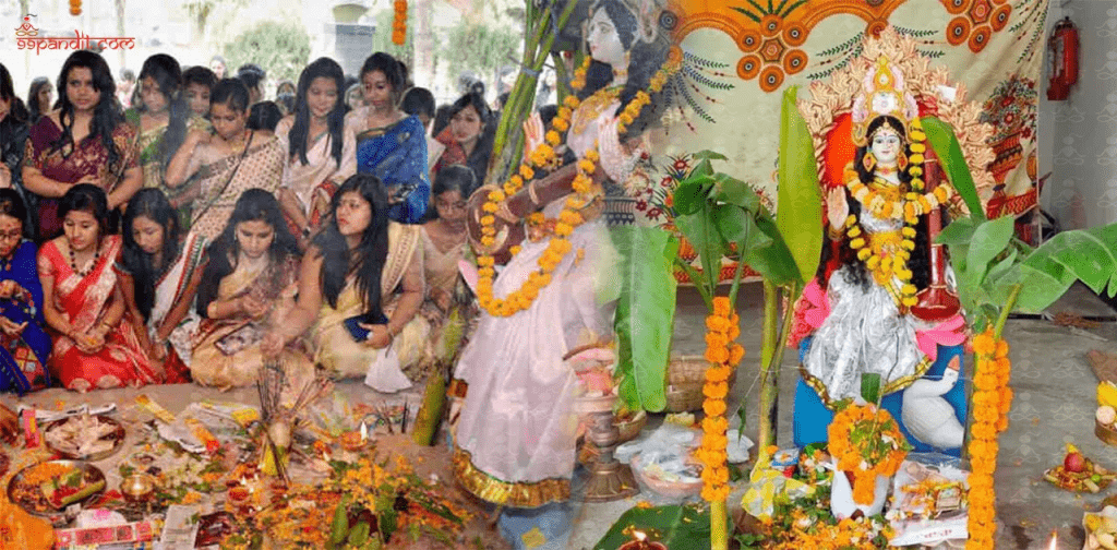 Nepali festival Basanta Panchami: Children offering books to Goddess Saraswati.