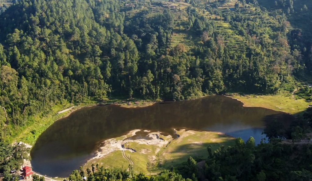 Green water of Baraha Pokhari, the Khotang lake with no visible inlet or outlet