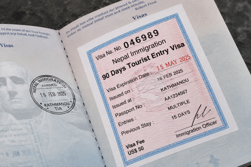 Passport and Nepal tourist visa extension paperwork
